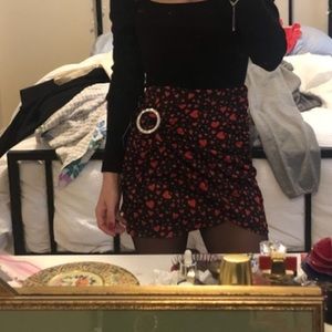Black mini skirt with red hearts